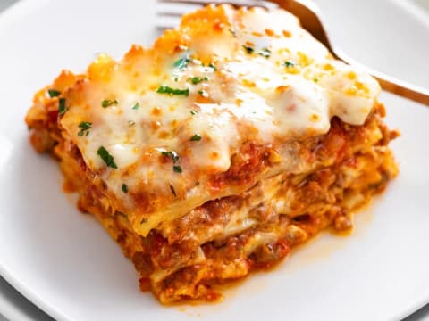 A slice of layered meat lasagna