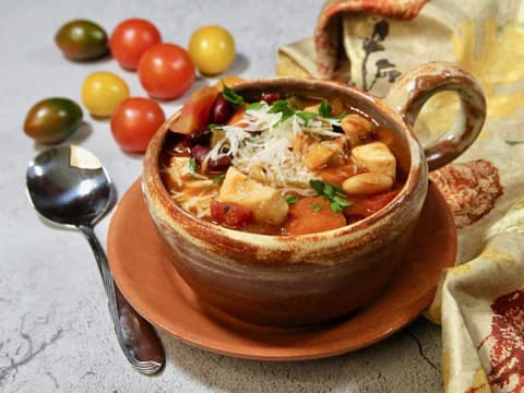 Bowl of minestrone soup with shell pasta